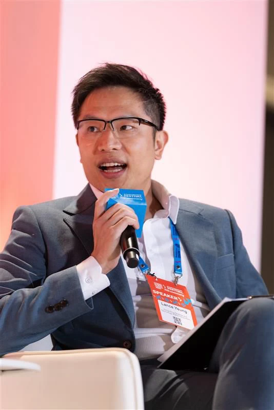 Lance Yeung speaking on a panel